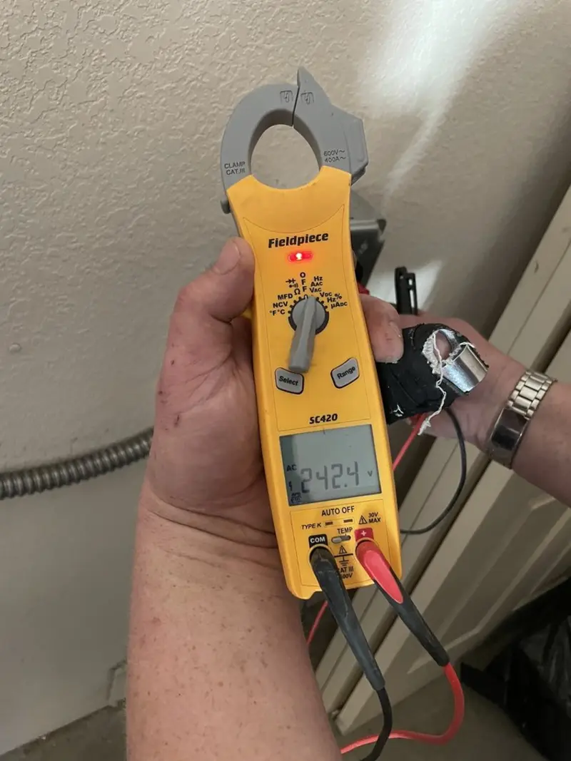 Voltage testing with clamp meter during Generator Installation in Sleepy Hollow